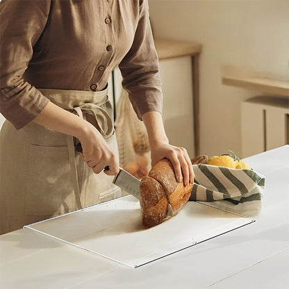 Planche a decouper - Ça mijote dans la cocotte